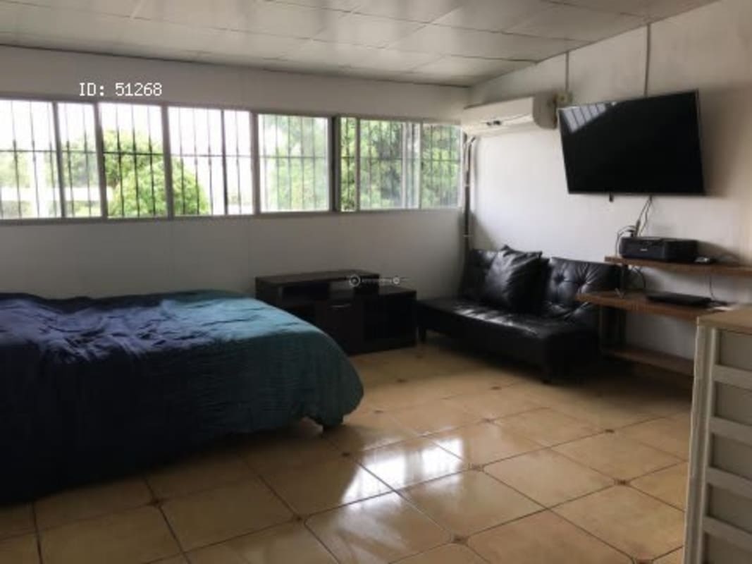 Cozy bedroom with bed, AC, closet, large windows in PH Residencial La Loma Panama City