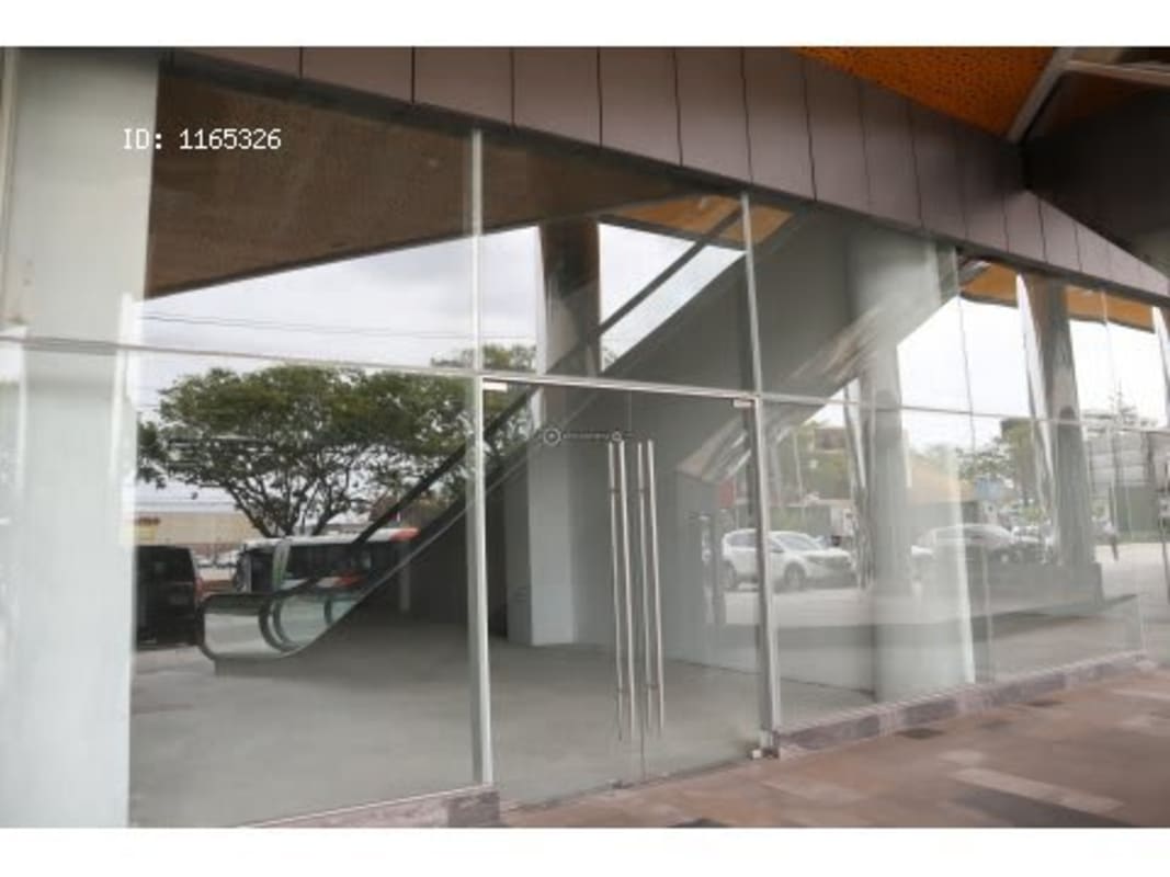 Modern commercial plaza storefront with glass facade at Dorado City Center on Via Ricardo J. Alfaro Panama City