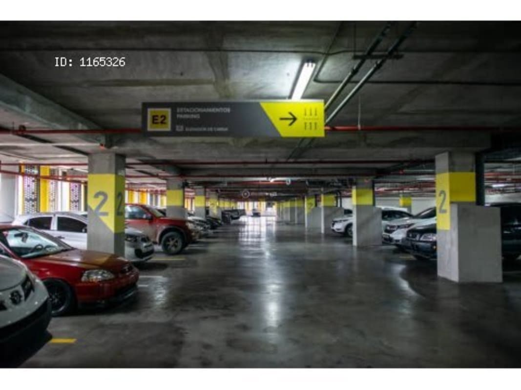 Spacious multi-level parking garage with secure access at Dorado City Center Panama City