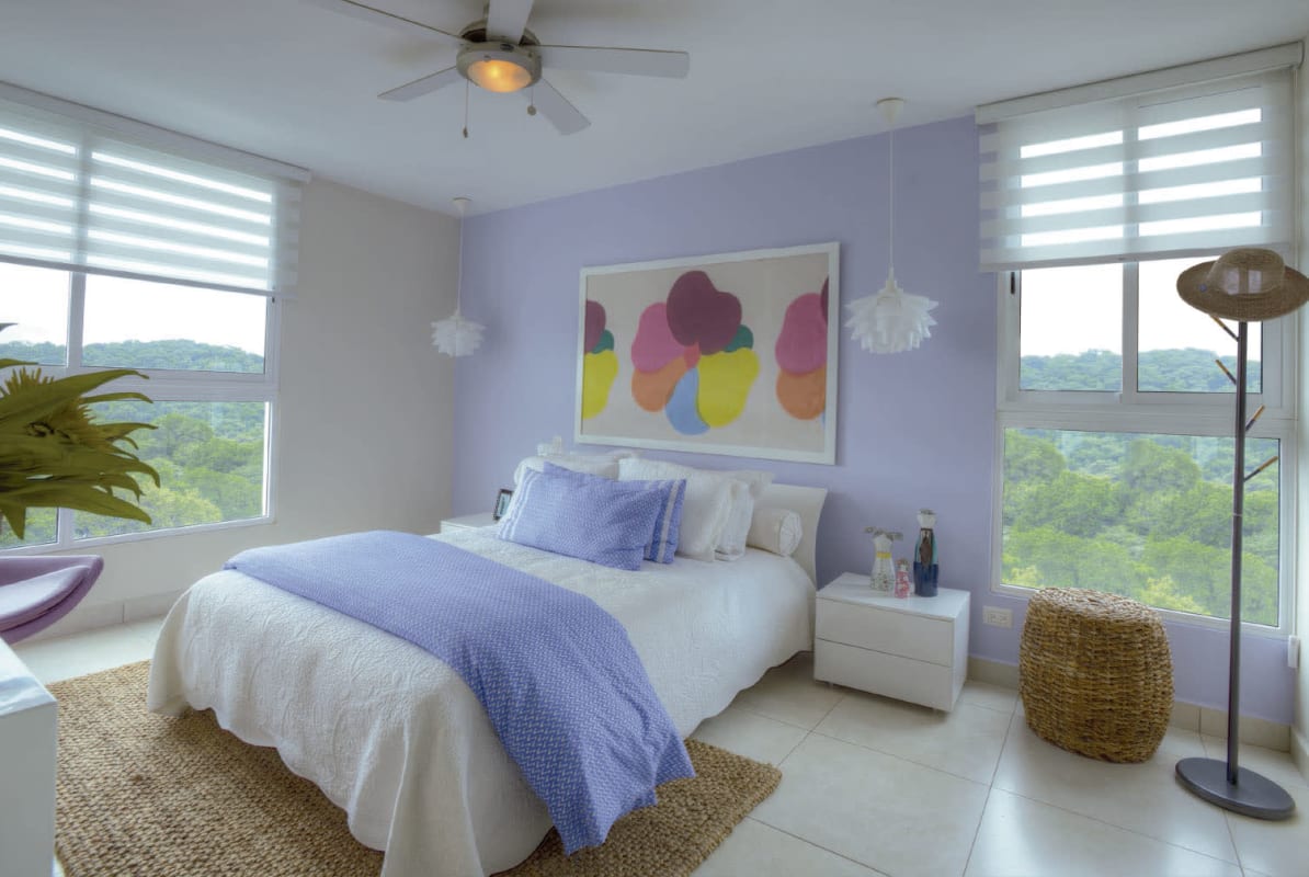 Bright master bedroom with large windows and scenic views in PH Clayton Park II Panama