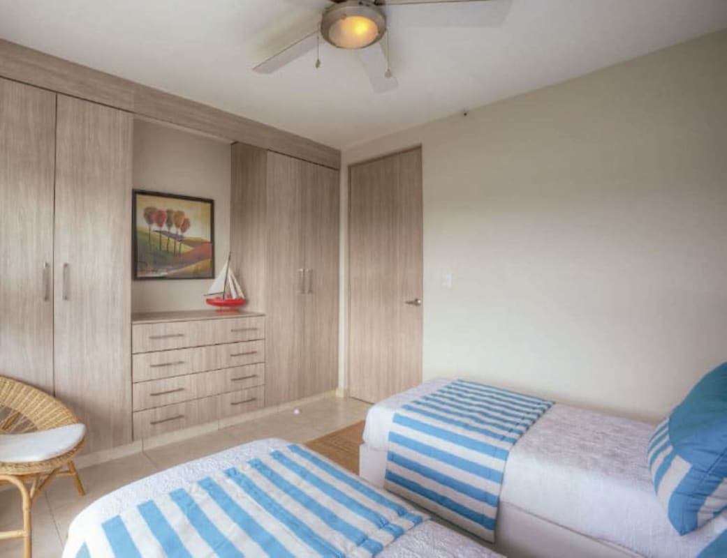 Bright bedroom with twin beds and built-in wardrobes Clayton Park II Panama
