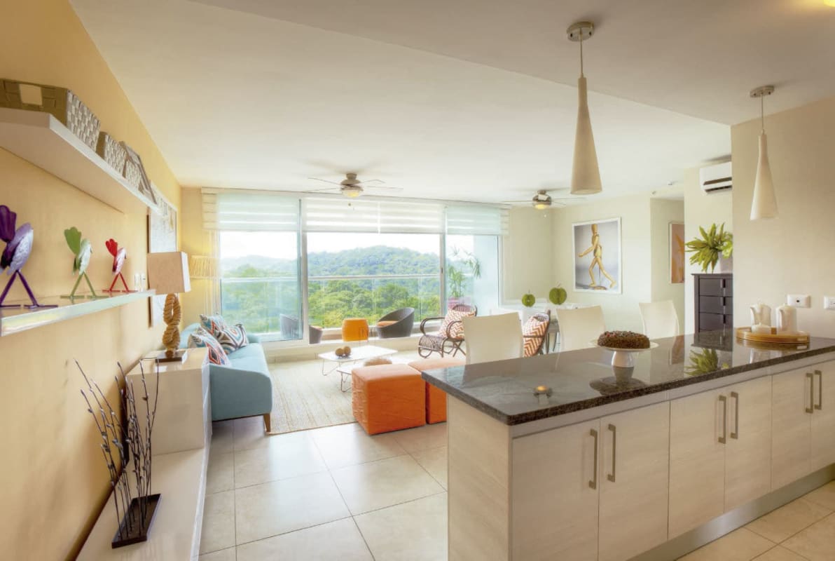 Bright open plan living room with mountain view balcony PH Clayton Park II Panama City