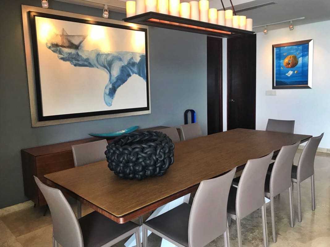 Spacious kitchen with granite countertops and wood cabinetry in PH Aqualina luxury apartment Panama