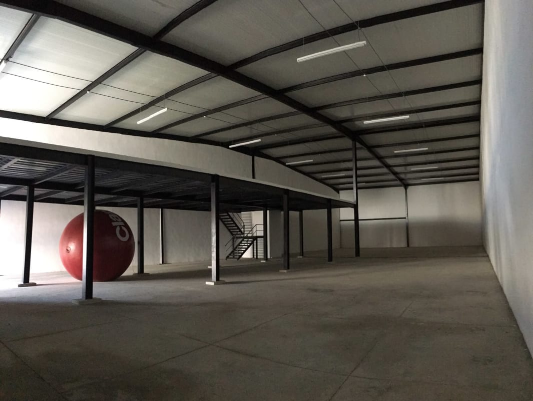 Modern warehouse with mezzanine level open floor space steel beams in Panama