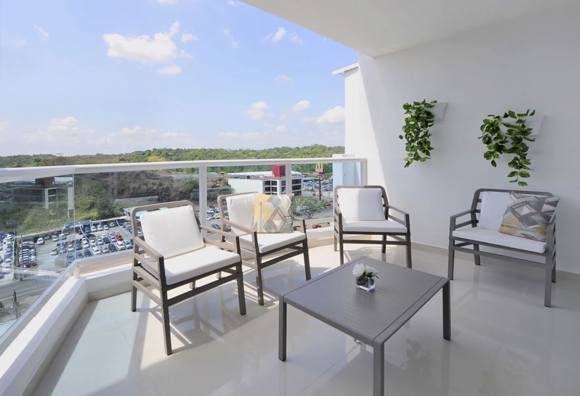 Modern bathroom in Mei Tower Panama with glass shower, vanity sink and minimalist design