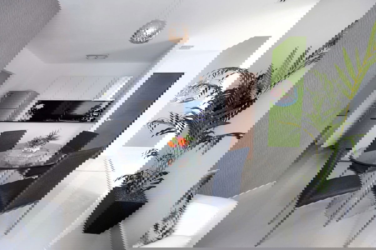 Versatile bedroom space with textured accent wall built-in desk PH MiCondado Condado del Rey Panama