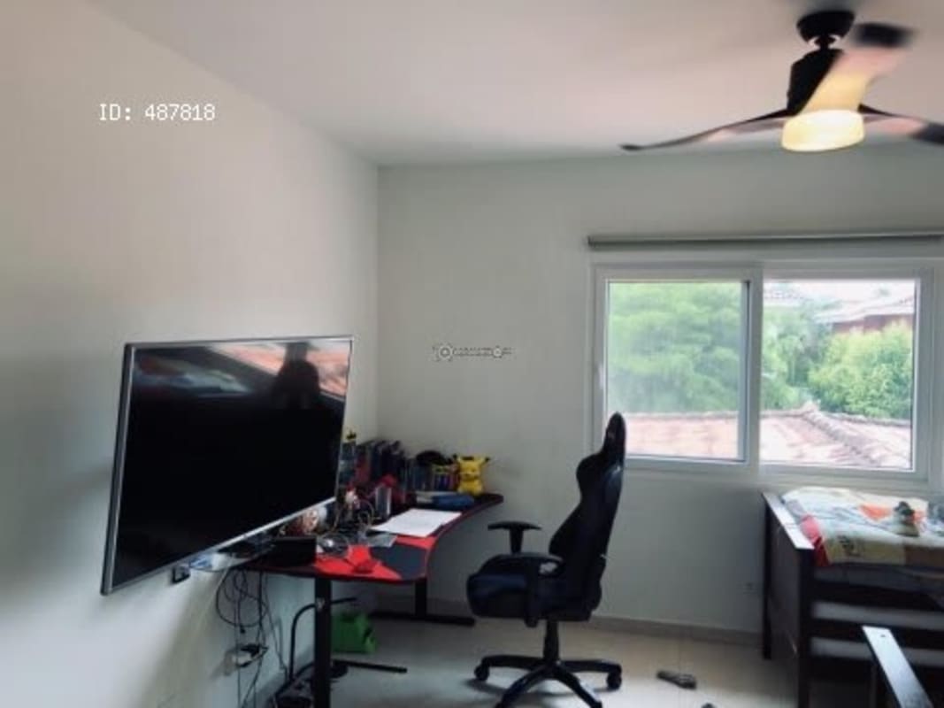 Bedroom and study area with natural light in Costa Serena luxury house Panama