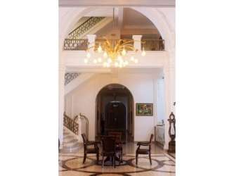 Colonial veranda with arches and tile floor at Hotel Washington Panama oceanfront