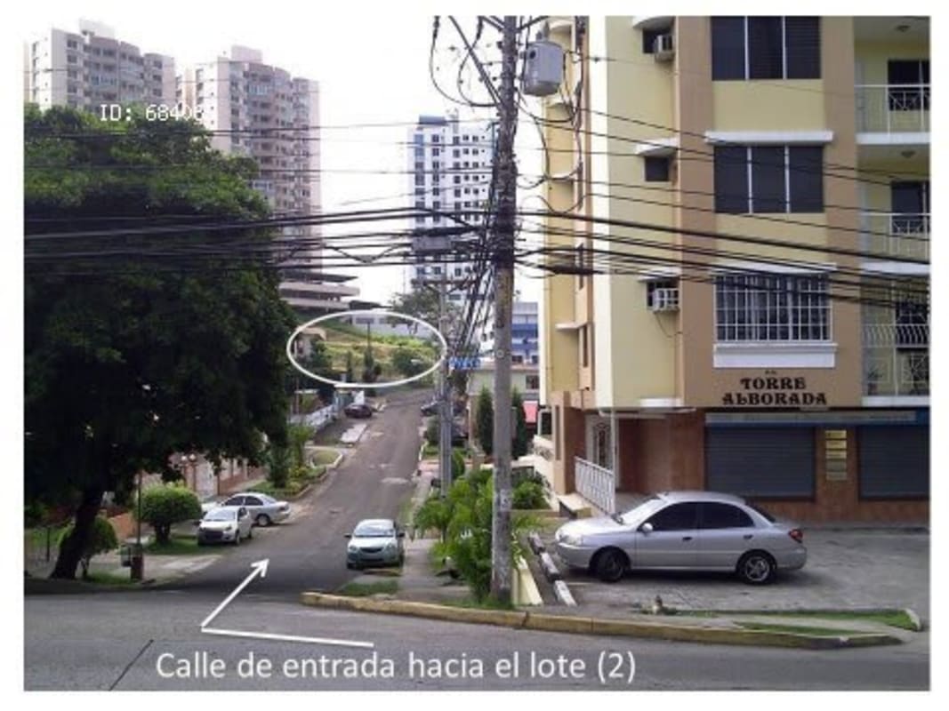 Quiet residential street near Bethania development land with apartment buildings and parking