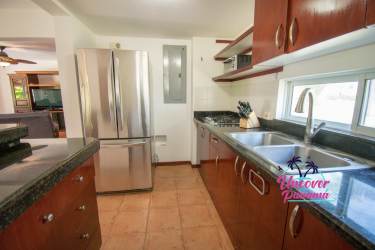 Guest bedroom with full size beds and AC at Costa Blanca Villas Decameron Panama