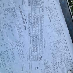 Architectural site plan showing zoning of residential lots and commercial area in Capira