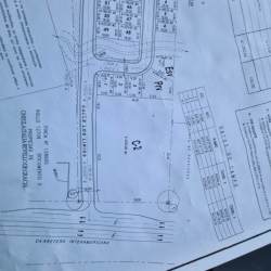 Blueprint of subdivision plan showcasing residential lots and commercial plaza in Capira Panama