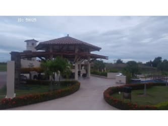 Spacious living room with sectional sofa sliding doors tiled floors PH Fontanella del Mar beach house Panama