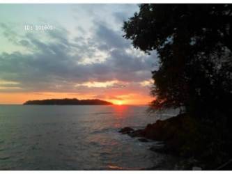 Tropical oceanfront gazebo with hammocks facing Santa Catalina surf beach in Panama