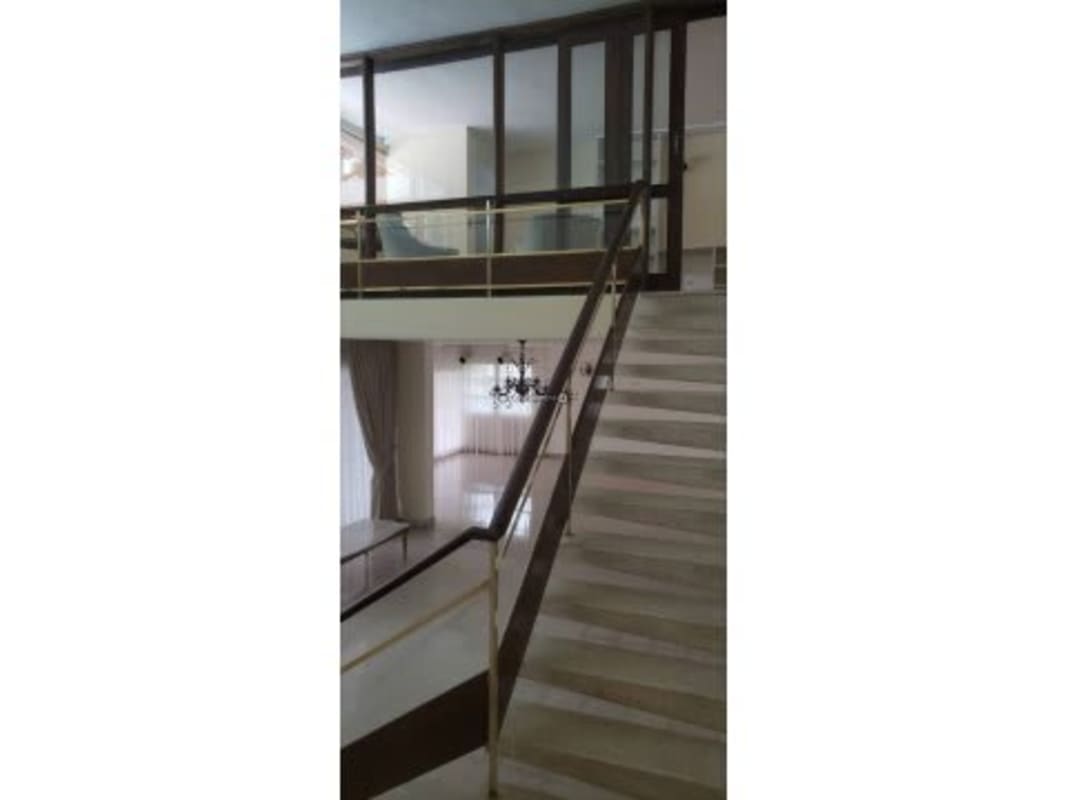 Elegant staircase area with chandelier marble stairs mezzanine Obarrio house