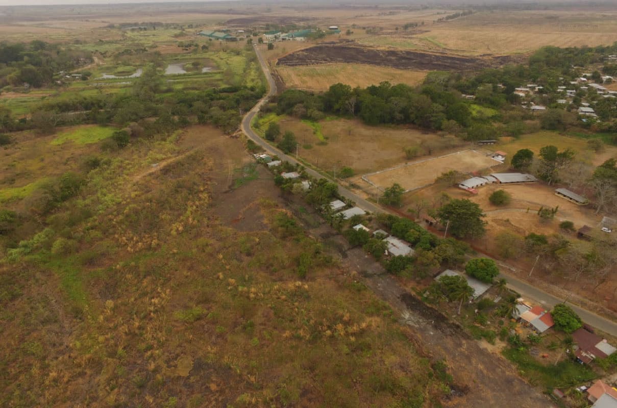 Aerial panoramic of countryside fields vegetation and small ponds Pacora Panama