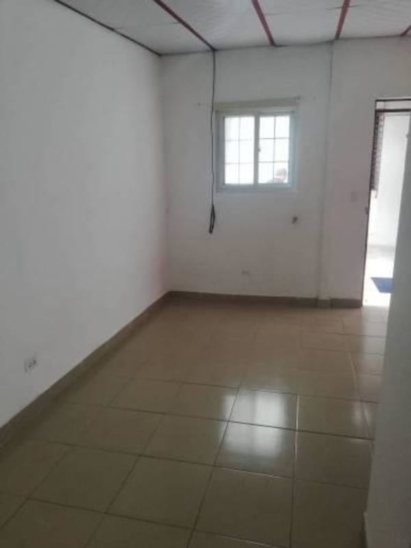 Basic bathroom with sink, toilet, walk-in shower in La Loma studio rental near Metro Panama City