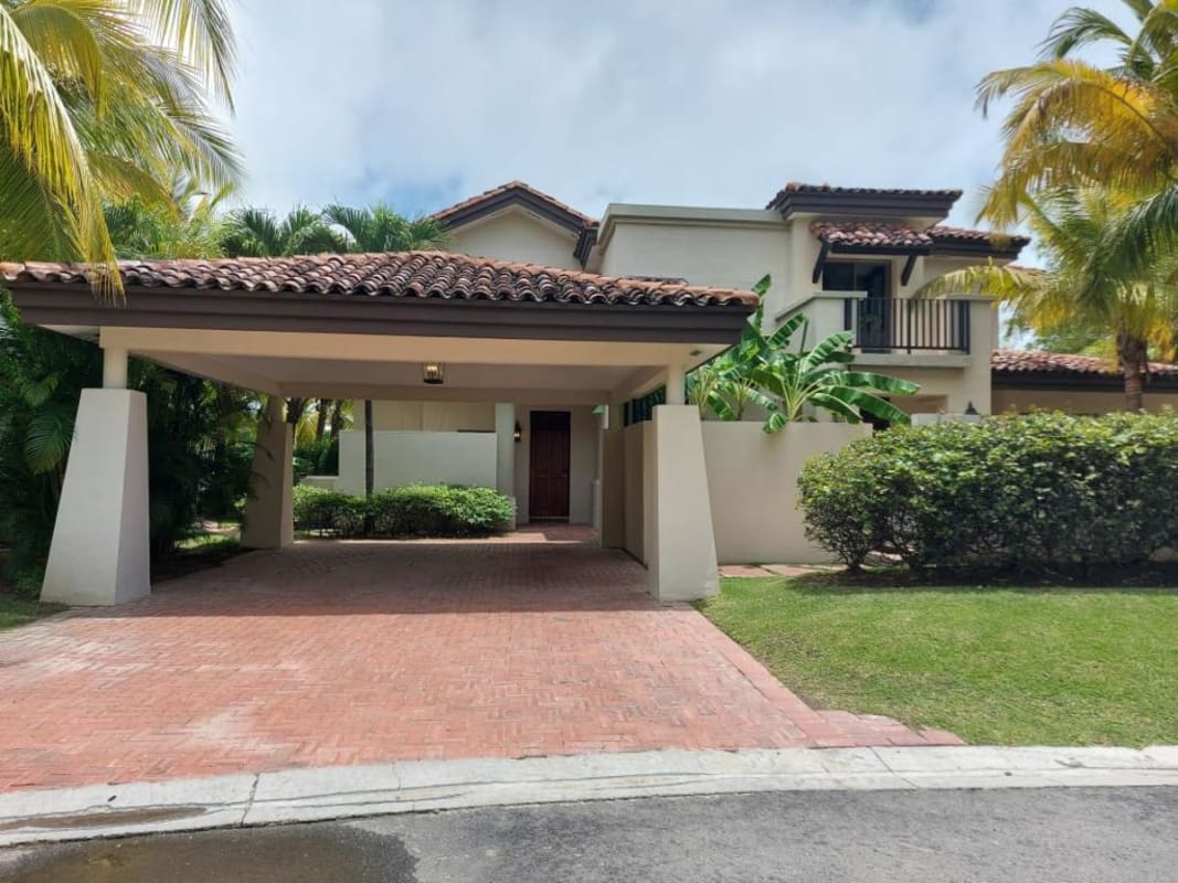 Two-story Mediterranean style villa with terracotta roof, balcony and carport Buenaventura Panama