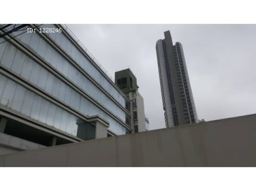 Modern glass and concrete façade of PH Plaza Ejecutiva commercial tower in Obarrio Panama