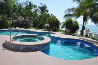 Bright living room with panoramic windows and ocean view PH Biltmore Playa Gorgona Panama