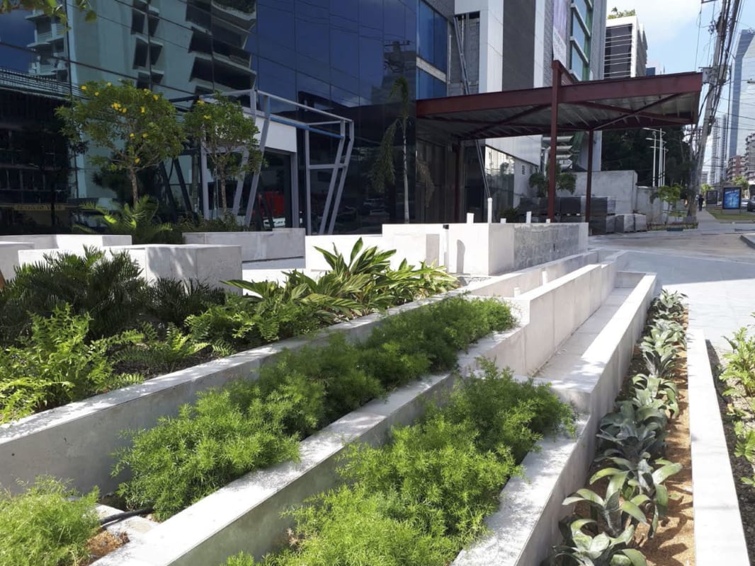 Concrete tiered outdoor space entrance of Panama Business Tower Obarrio.