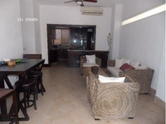 Bright open concept living dining area with views to ocean balcony Vistamar Panama