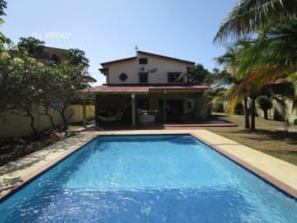 Large outdoor pool with tropical garden Playa Malibu Nueva Gorgona Panama