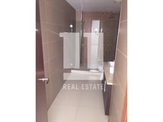 Modern apartment building facade with balconies in PH River Valley Panama Pacifico