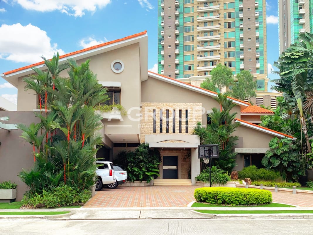 Spacious living room flooded with light marble floors luxury mansion for sale Punta Pacifica Panama