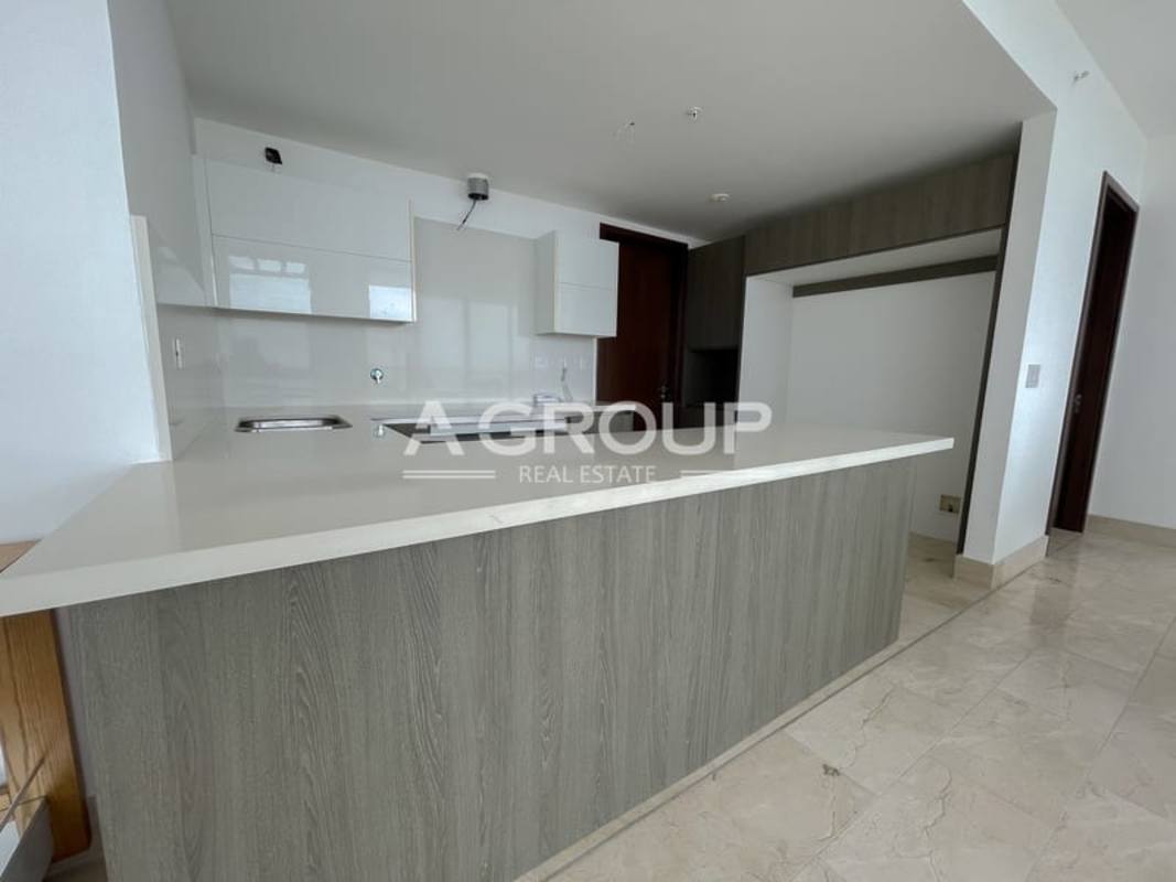 Luxury bathroom with marble finishes and walk-in glass shower PH Panorama Coco del Mar Panama