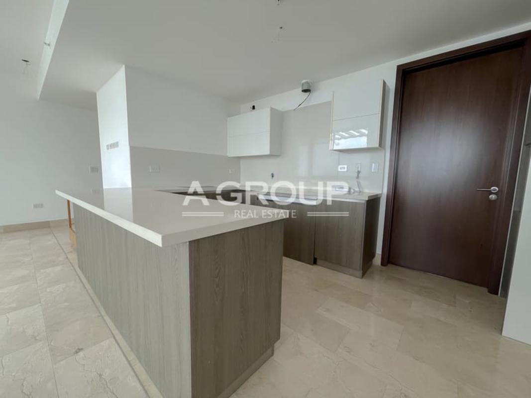 Marble countertop kitchen with custom cabinetry in PH Panorama luxury condo Coco del Mar Panama