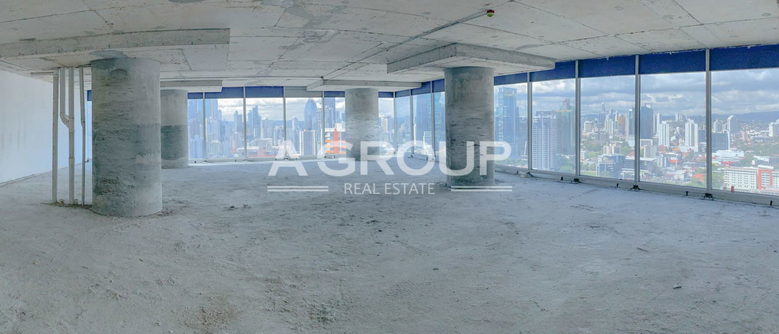 Unfinished office with panoramic floor-to-ceiling windows overlooking ocean skyline in Oceania Business Plaza Punta Pacifica Panama