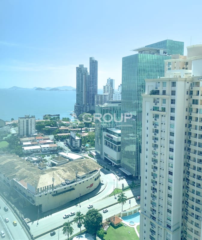 Coastal city skyline with skyscrapers and ocean including Oceania Towers Punta Pacifica Panama