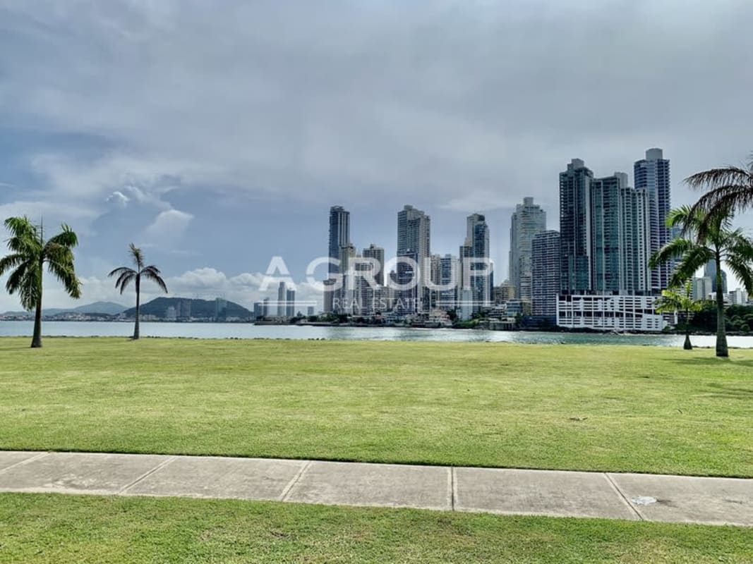 Skyline of Panama City over waterfront lagoon from Ocean Reef Islands development