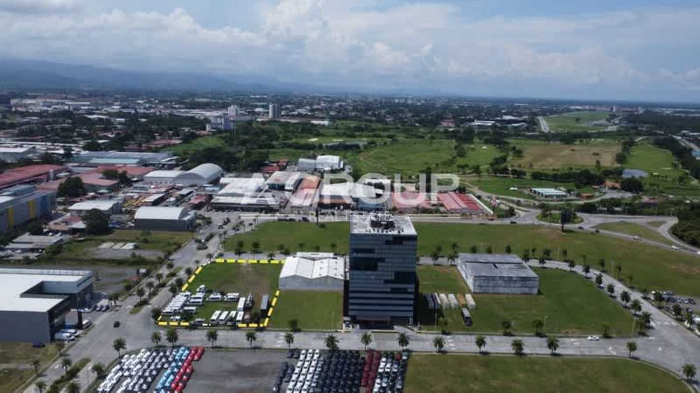 Aerial of Santa María Business District including golf areas, office towers, and commercial plots Panama