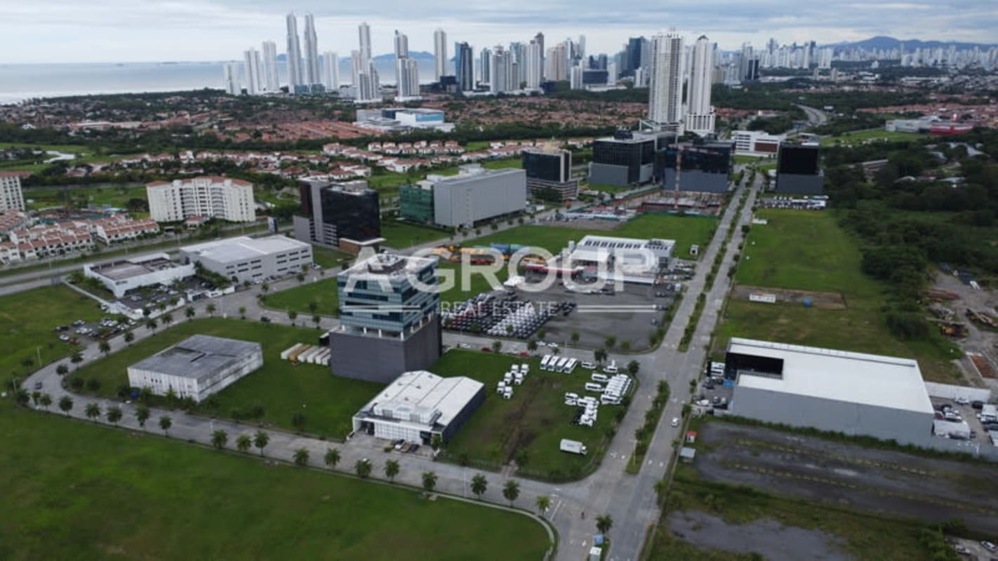 Aerial shot showing corporate skyscrapers and empty commercial plots in Santa María Panama City