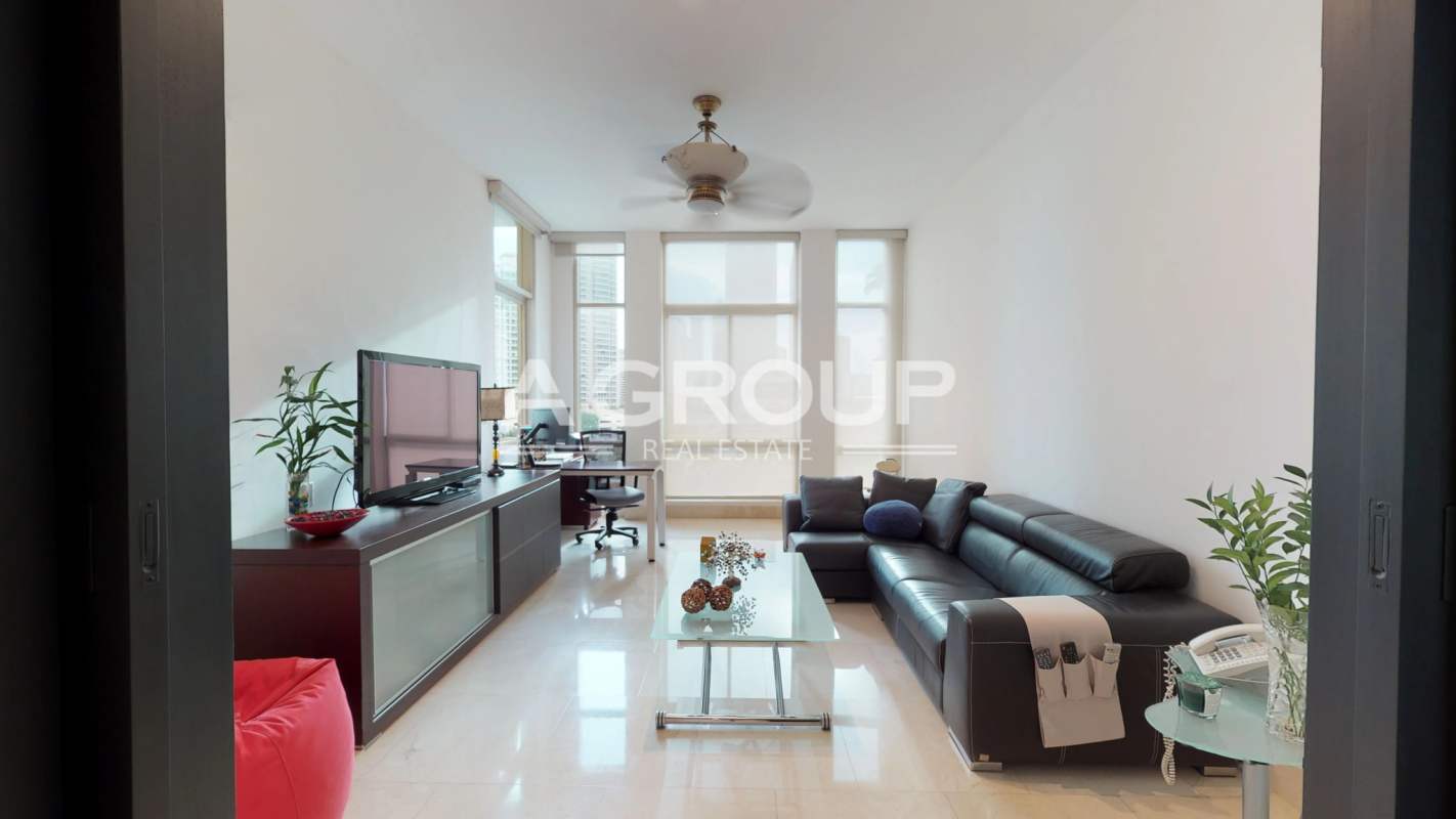 Large master bedroom with balcony access, ocean view, marble flooring in Pacific Point Panama