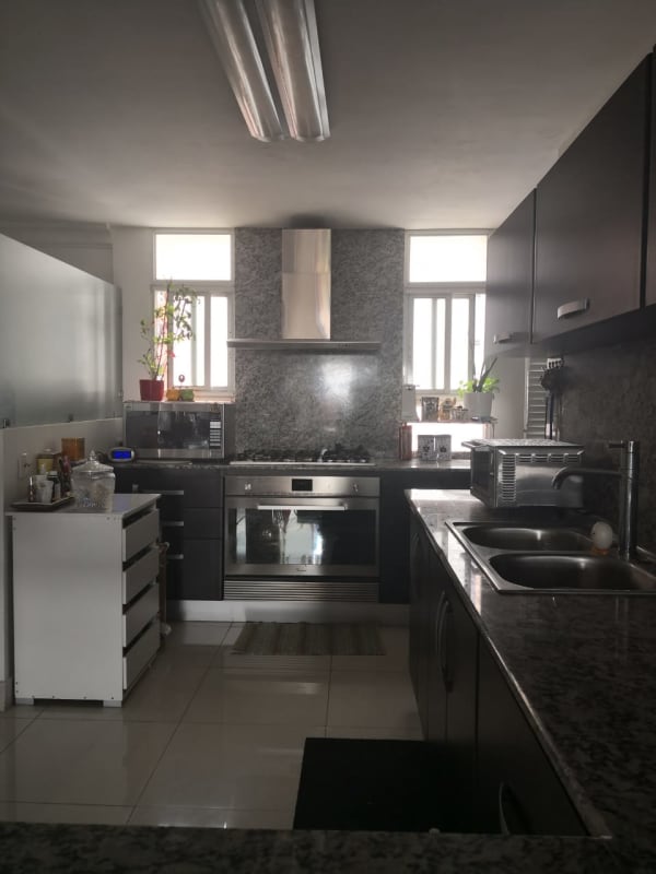 Upgraded kitchen with modern cabinetry granite counters PH Villa de las Fuentes Panama