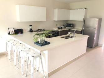 Spacious living area opening to terrace beachhouse Casamar Panama