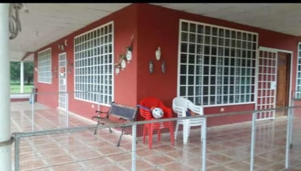 Main entry and patio of country property with landscaping in Calobre Veraguas