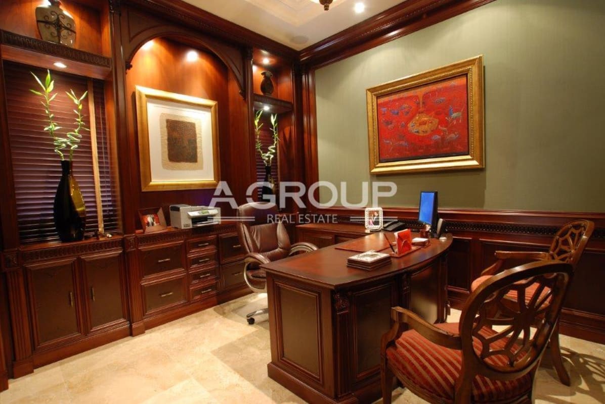 Traditional luxury office with wood paneling desk and artwork Costa del Este Panama