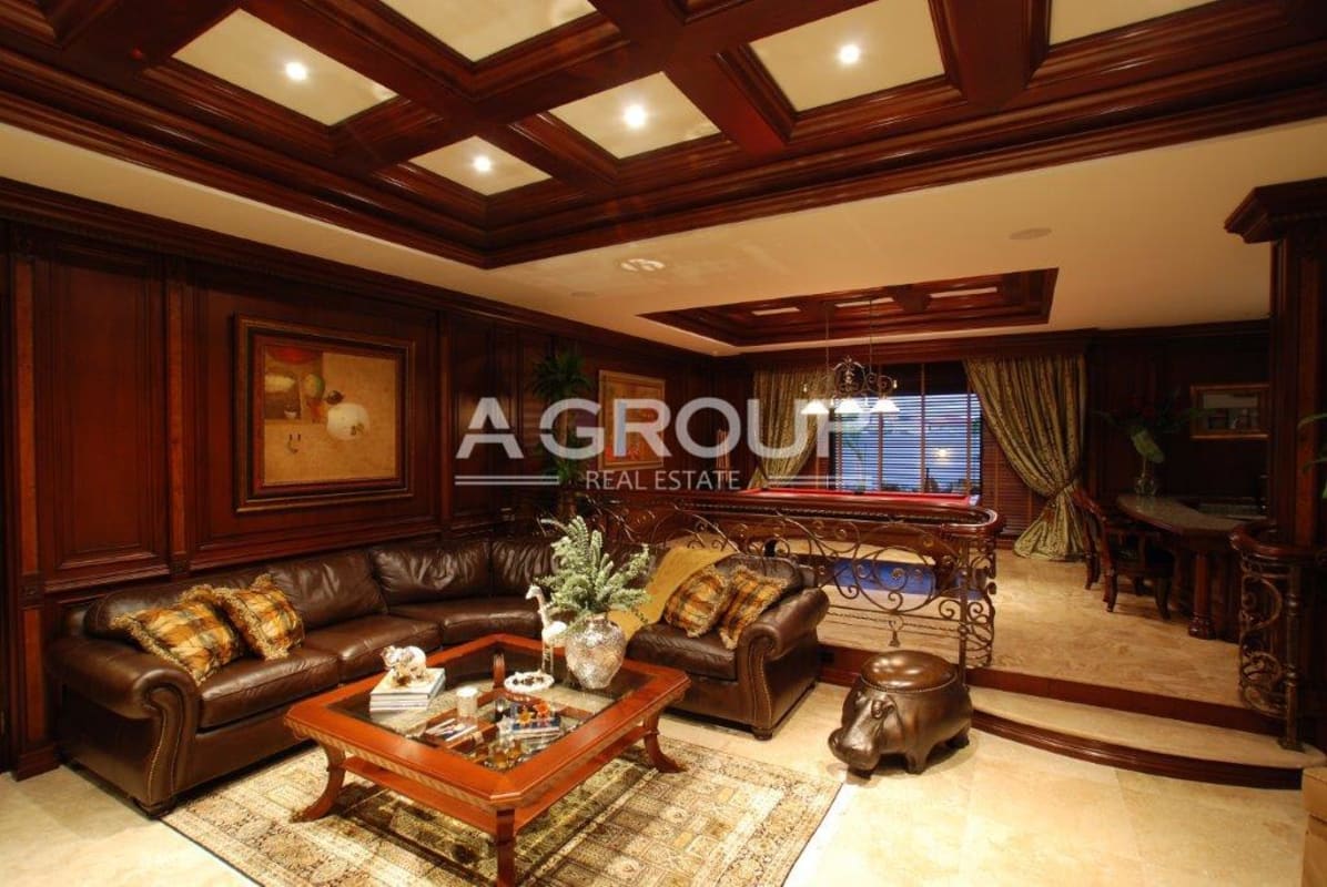 Living room with coffered ceiling leather sofa billiard table Costa del Este Panama