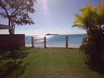 Direct private beach access from tropical garden at Playa Blanca villa rental with ocean views