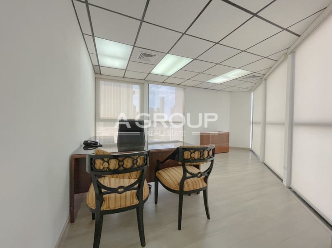 Executive corner office with floor-to-ceiling windows Marbella Humboldt Tower