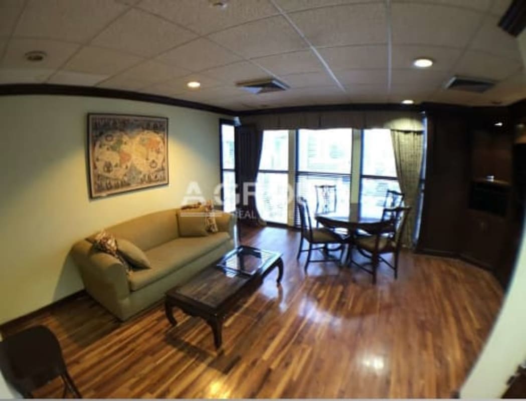 Open plan corporate office with hardwood floors, full glass window walls in Humboldt Tower, Marbella Panama