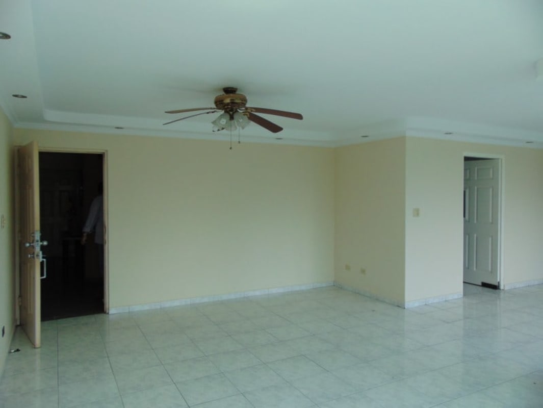 Spacious master bedroom with walk-in closet and window view PH Mirabel Club de Golf Panama