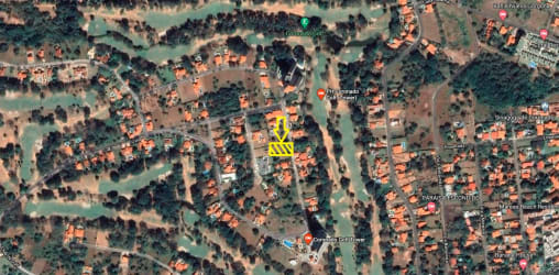 Golf course surrounded by Mediterranean-style homes in Coronado Panama aerial view