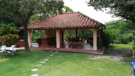 Spacious covered patio with bar counter at Punta Barco estate Panama for sale