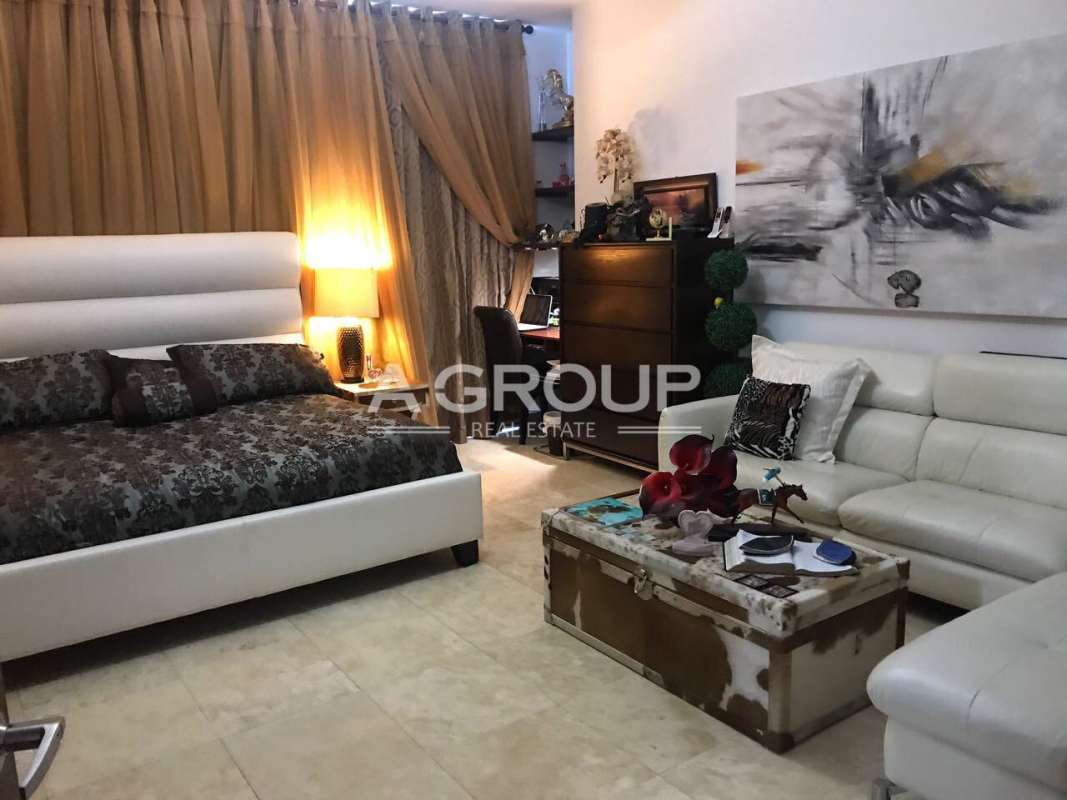 Cozy sitting area with ocean skyline views floor to ceiling windows PH Aqualina Punta Pacifica