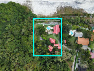 Tropical luxury estate beachfront with pool, guest houses and lush landscaping at Sea Cliff Santa Clara Panama